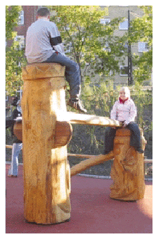 Children climbing on wooden structures
